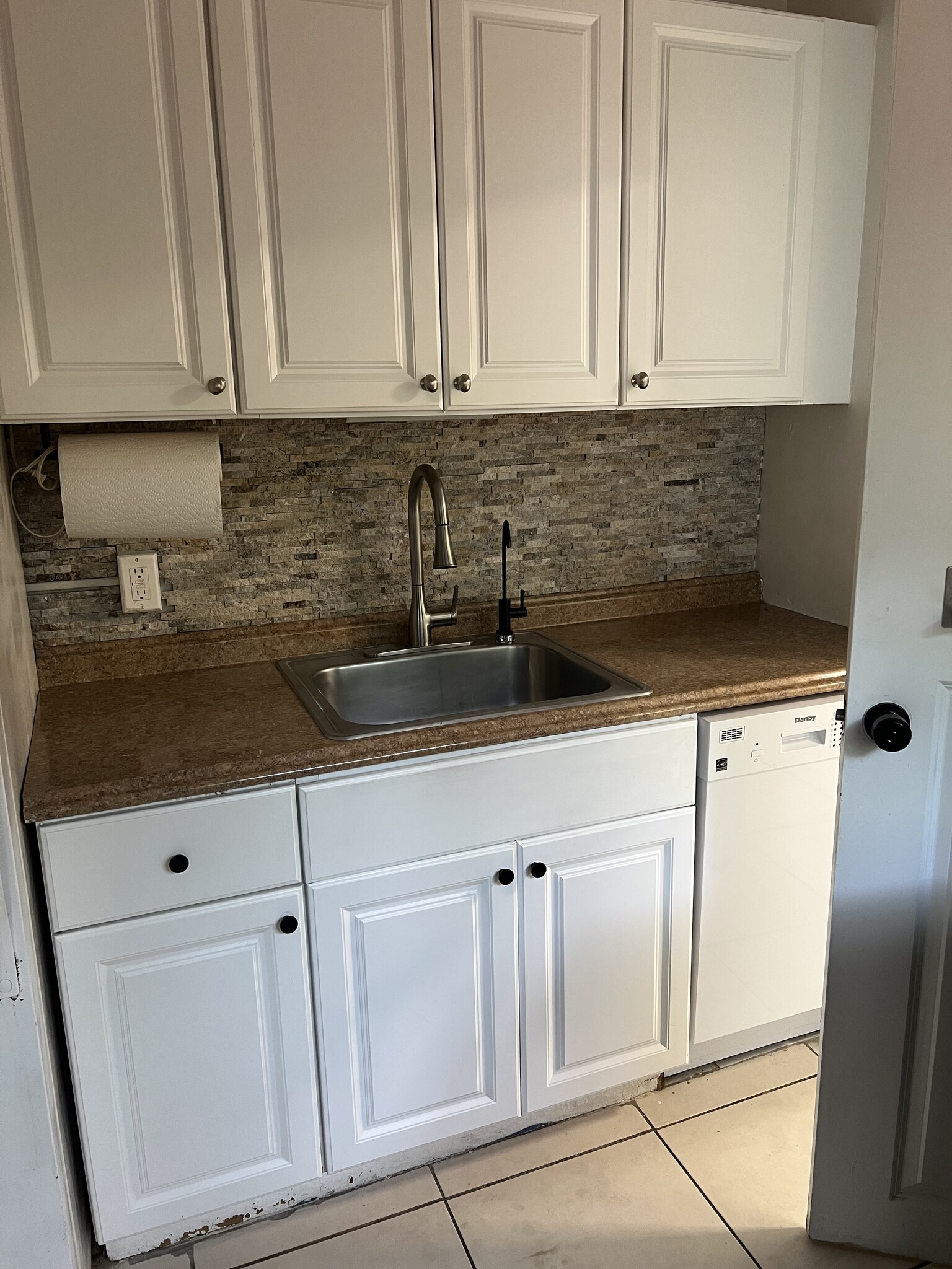 Kitchen with filter water faucet - 1301 NE 6th St