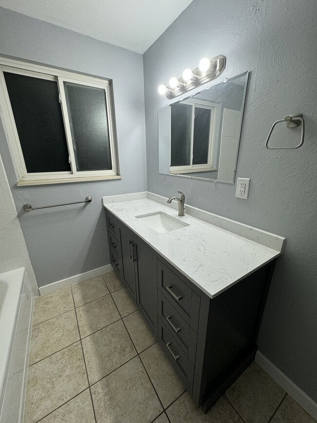 large vanity, new, with storage - 4015 Tappan Dr