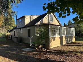 Building Photo - Updated 5 bedroom farm house with a large ...