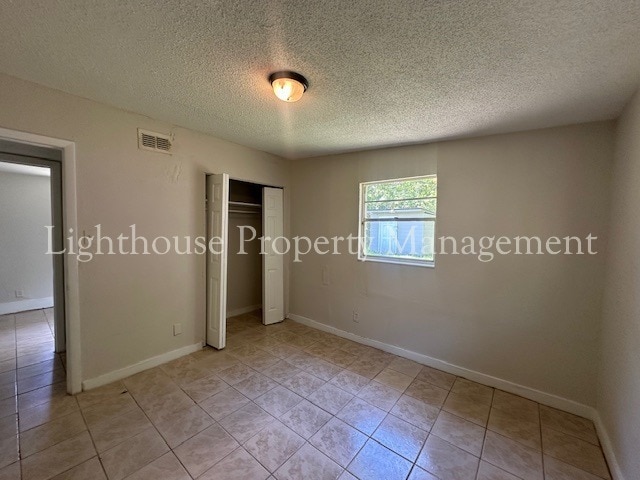 Building Photo - Bright 4 Bedroom Home With Tile Flooring Throughout