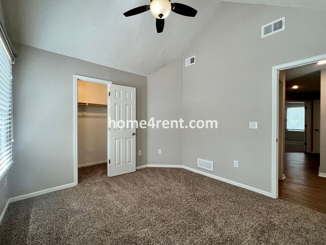 Building Photo - Updated Kitchen, Large Two Tiered Deck, Finished Basement in Blue Valley Schools!