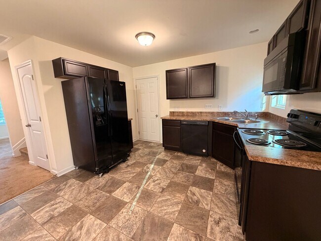 Building Photo - Available Now – Spacious 4BR Home on 1.5 Acres in Rural Hall!