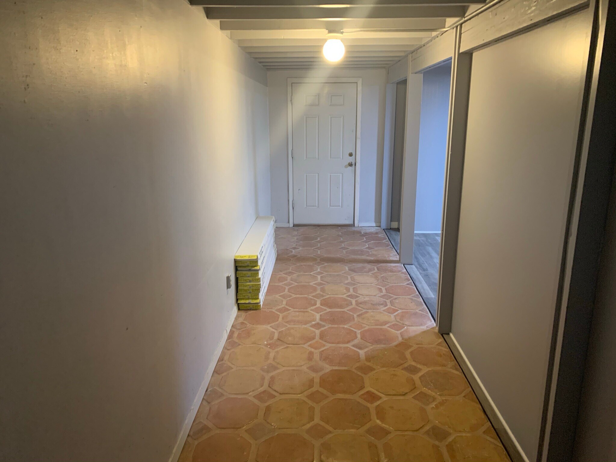Main Hallway w/Dining Area to the right - 1523 N Alleghaney Ave