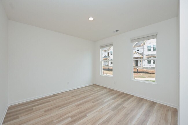 Building Photo - **BE THE FIRST PERSON TO LIVE IN THIS BRAND NEW BRICK TOWNHOME IN THE VILLAS AT REGAL SQUARE FEAT...