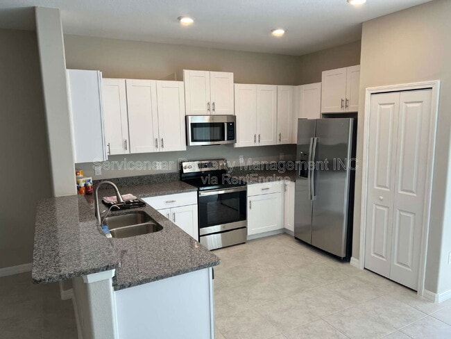 Building Photo - 9625 Pembrooke Pines Dr