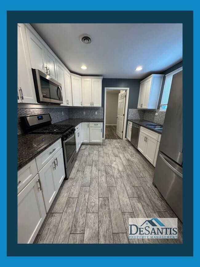 Building Photo - Spacious 4-Bedroom Home with Classic Charm & Modern Touches!