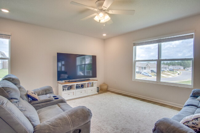 Building Photo - Spacious 4BR Home with 2-Car Garage Near M...