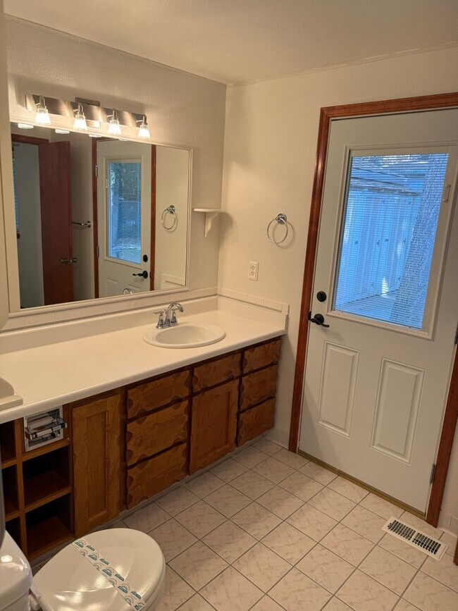 Building Photo - Beautiful 3 Bedroom Ranch Style House with 2 Car Garage, Fences Yard, Fireplace, Shed, Workshop &...