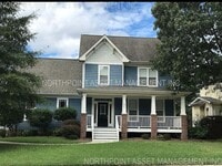Building Photo - Charming Single Family Home. 4 bedroom 2.5...