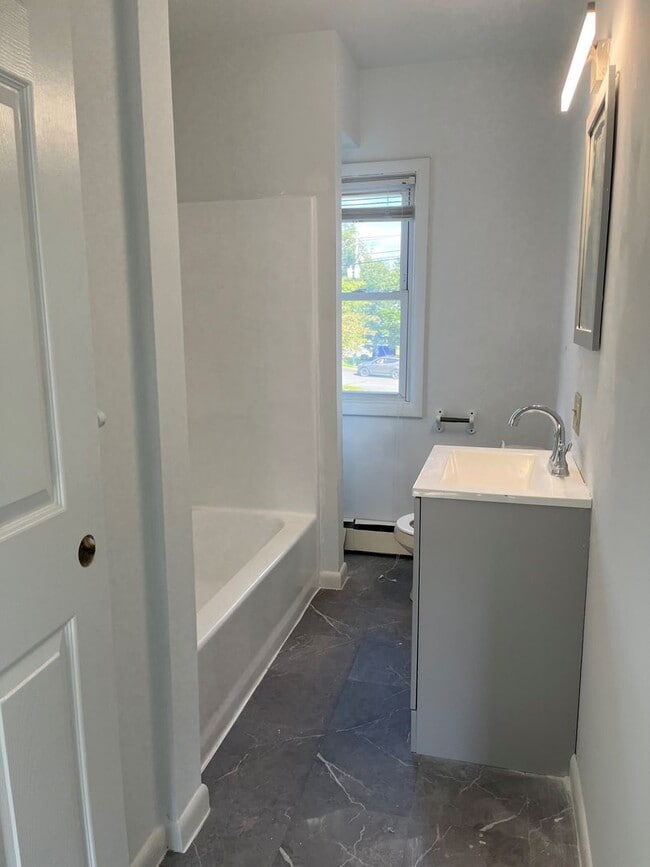 Building Photo - 7-MXW Holding Corp