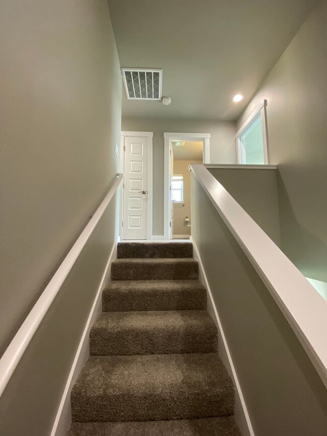 Building Photo - This Townhome Will Having You Falling Head Over Heels!