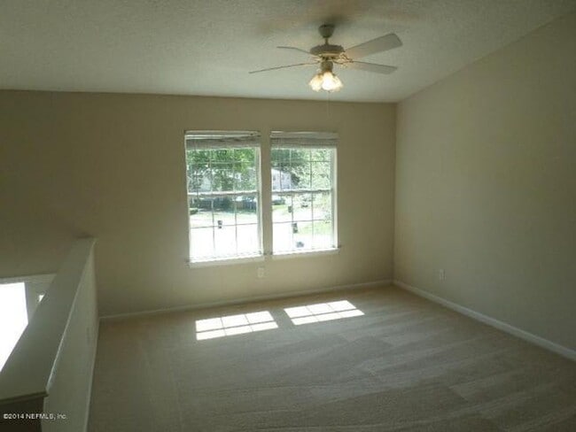 Building Photo - Welcome to this charming 2-bedroom, 2-bath...