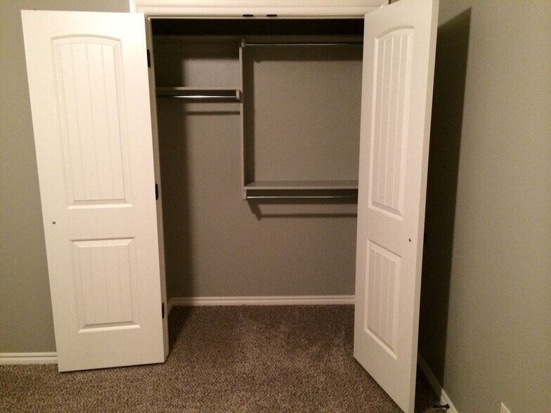 bed 2 & 3 closets - 209 Ashley Dr
