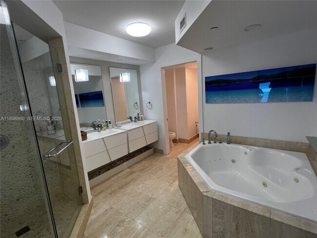 Building Photo - 18671 Collins Ave