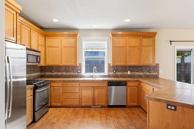 Building Photo - NEW Price - Delightful 4-Bedroom, 2.5-Bath...
