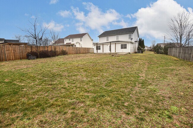 Building Photo - Pet Friendly Three Bedroom with Bonus!