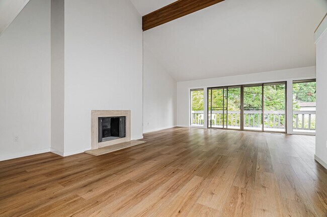 Building Photo - Top-Floor Condo with Forest Views, Large Private Deck & Resort-Style Amenities