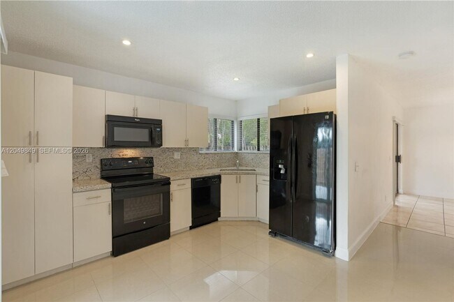 Building Photo - 9587 SW 148th Ave