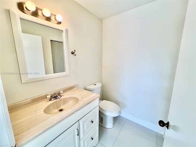 Building Photo - 3 br, 2.5 bath Condo - 8625 SW 152nd Ave A...