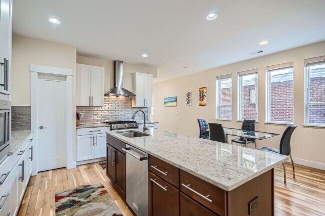 Building Photo - Available NOW! SIX MONTH LEASE - Spacious 3-Bedroom Townhouse with 3.5 Baths in Vibrant Sloans Lake!