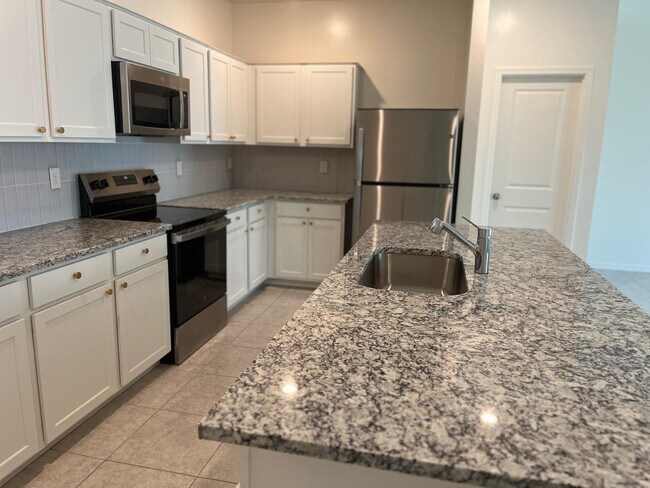 Building Photo - 4466 N 100th Dr