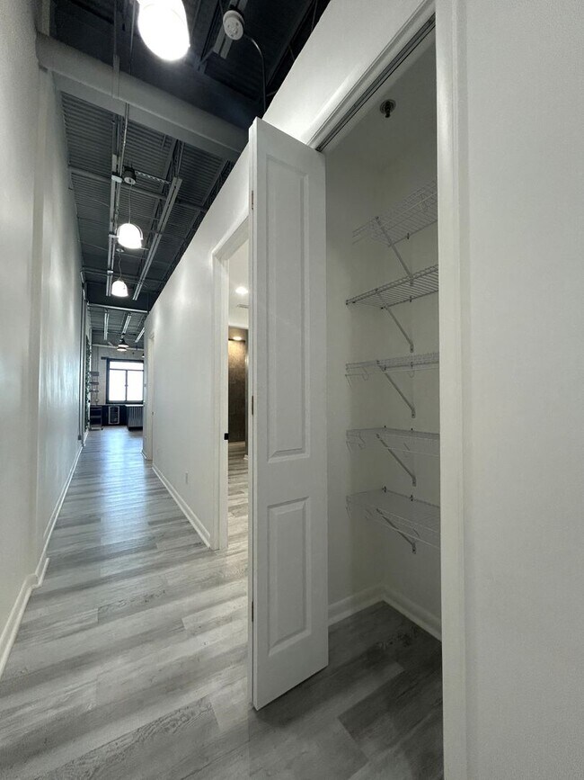 Building Photo - Industrial Style. Downtown Energy. Elevated Living.