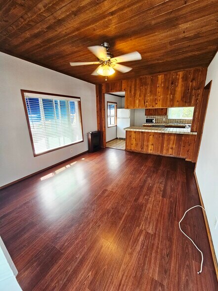 Living Room with wood laminate floors. - 934 S Myers St