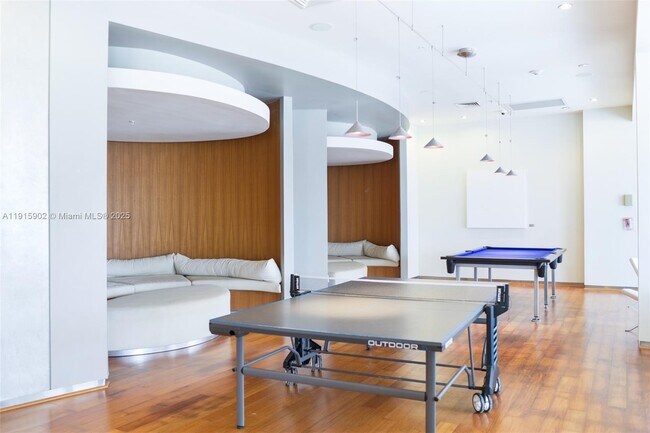 Building Photo - 10275 Collins Ave