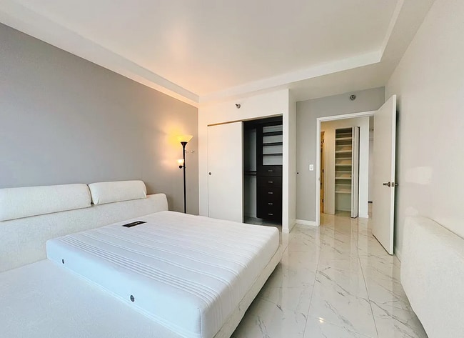 Building Photo - "Modern 1-Bed Oasis in Flushing with Pool ...
