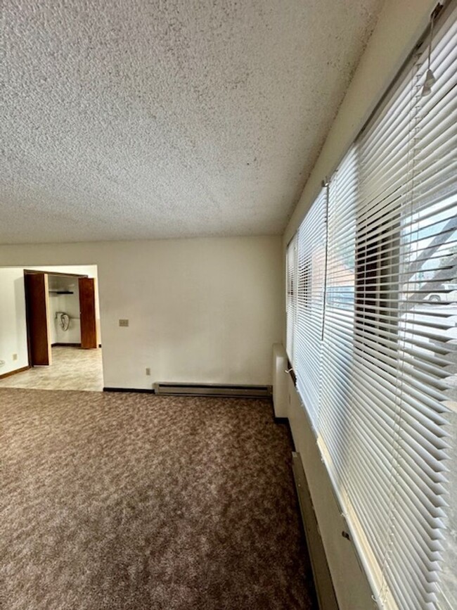 Building Photo - Charming 2-Bedroom Apartment Near MSU – Ca...