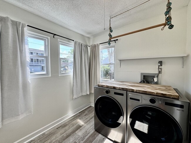 Building Photo - Ready NOW! A Custom Townhouse-Style Duplex Blocks to the Beaches! Fenced Yard - Hot Tub - Pet Fri...
