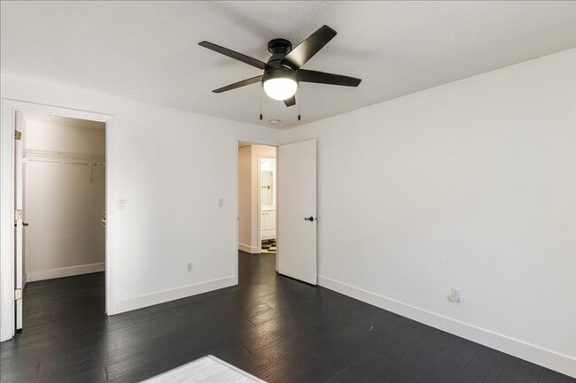 Building Photo - Versatile 4-Bedroom Corner Condo with Main...