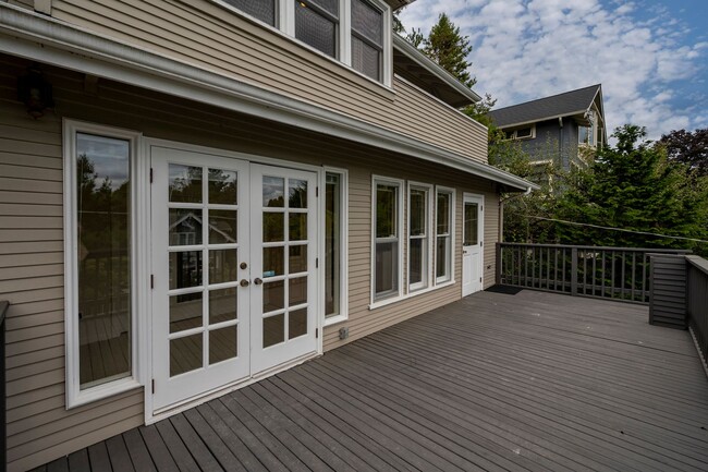 Building Photo - Traditional Four-Corner Craftsman Home on ...