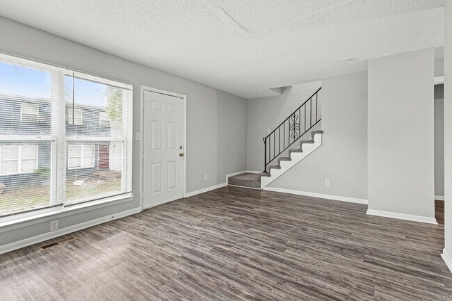 Building Photo - Summer Special! Updated 3BR Townhome with Basement + $250 Off First Month’s Rent