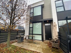 Front of home gated with deck - 435 W Hobbie St