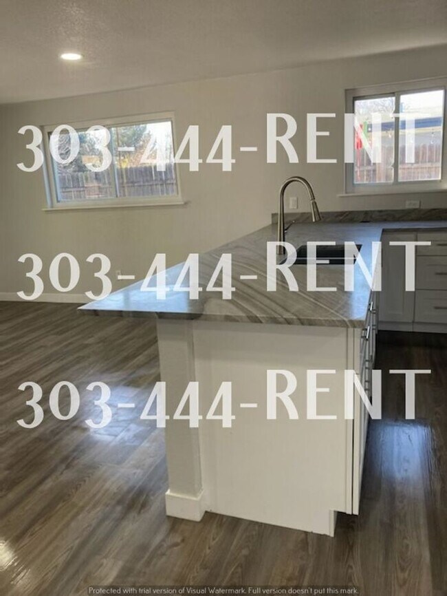 Building Photo - Welcome to this stunning 3-bedroom, 2-bath...