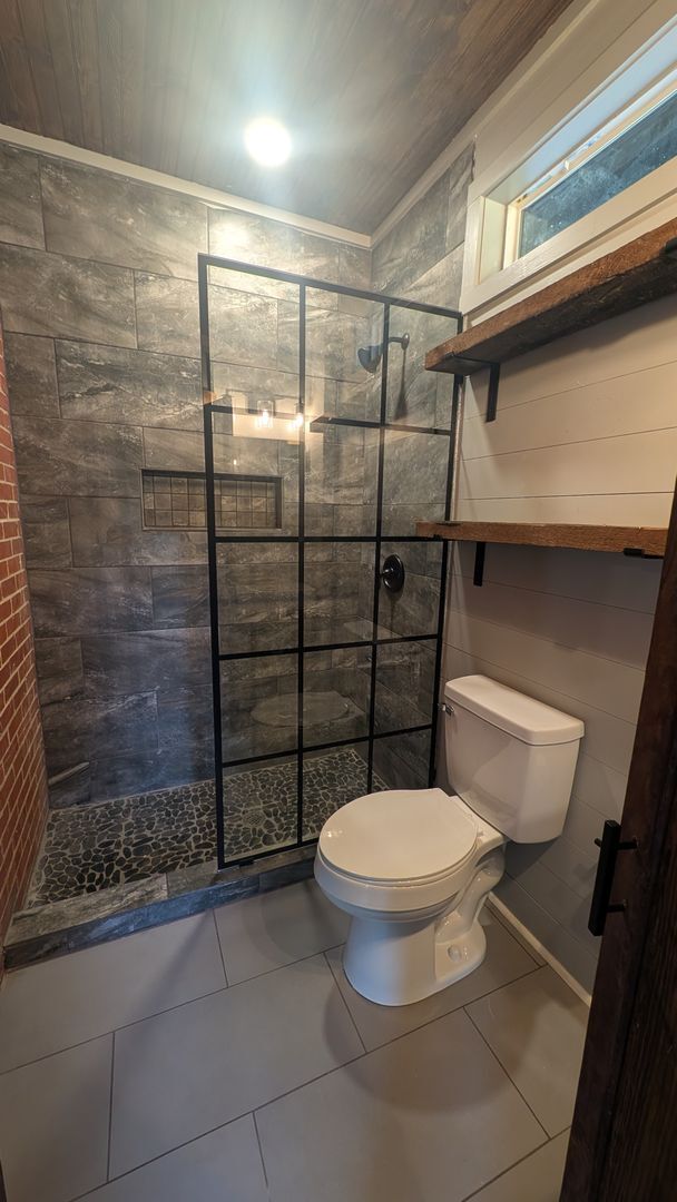 Building Photo - Completely remodeled Studio Home
