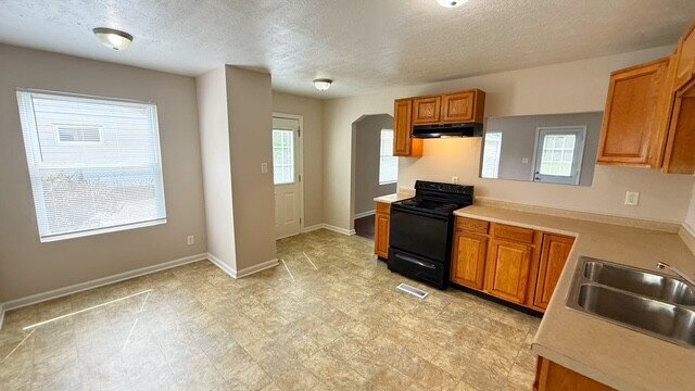 Building Photo - GORGEOUS EAST SIDE 3 BR/1.5 BA STONE RANCH AVAILABLE NOW!