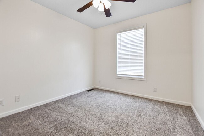 Building Photo - Pet Friendly Three Bedroom with Bonus!