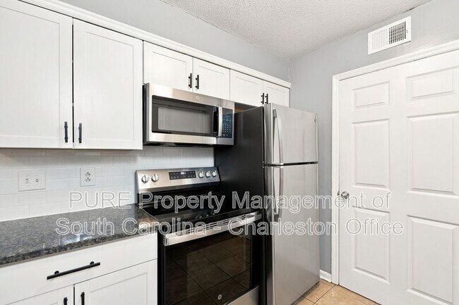Building Photo - 1402 Camp Rd