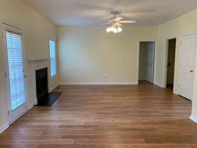 Building Photo - SPACIOUS HOME WITH DOWNSTAIRS PRIMARY BEDROOM AND BATH- LAKE WHEELER/ FARMER'S MARKET AREA