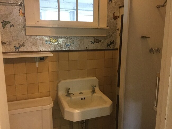 Building Photo - Centrally Located Home on Corner Lot with Small Pets Considered