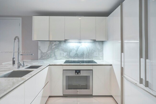 Building Photo - 10203 Collins Ave