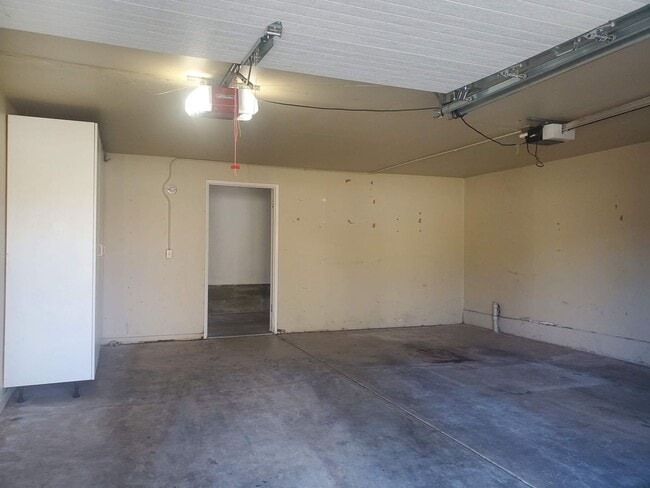 Building Photo - Private 2x2 Santa Rosa Townhouse with pool, 2-car garage, workshop area, fireplace, W/D Hookups