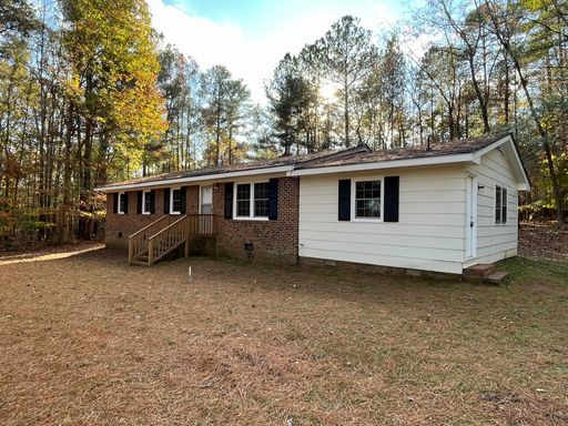 Building Photo - Charming 3BD, 2BA Wake Forest Home on a Large, Private Lot with a Detached 2-Car Garage, Providin...