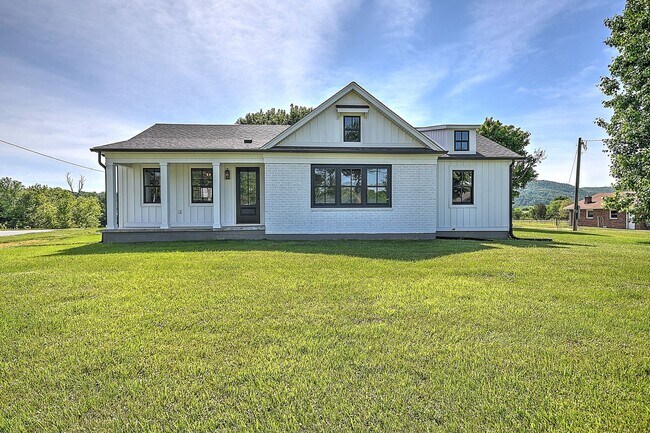 Building Photo - Updated and restored Original Farm House Style