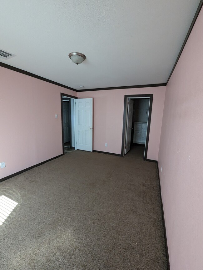 Room 2 Looking to entry door and closet door - 179 Davis Rd