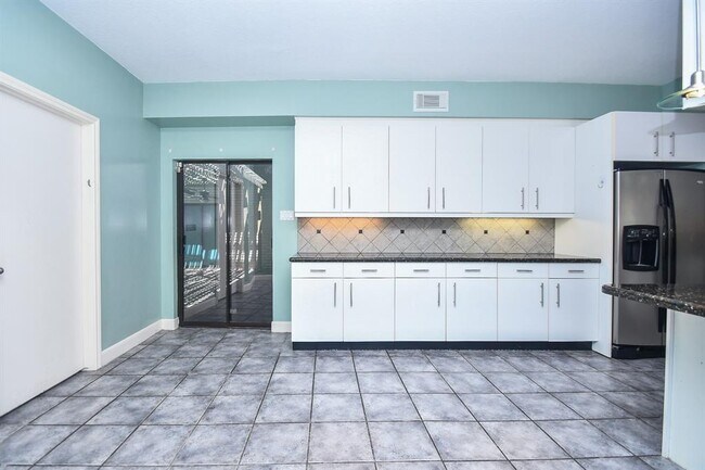 Building Photo - 7706 Coachwood Dr