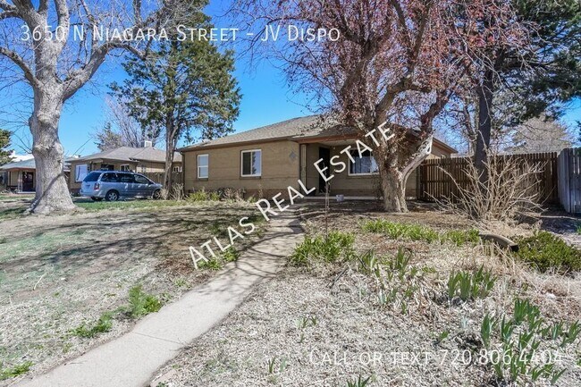 Building Photo - Desirable 4 bed /2 bath home in the middle...