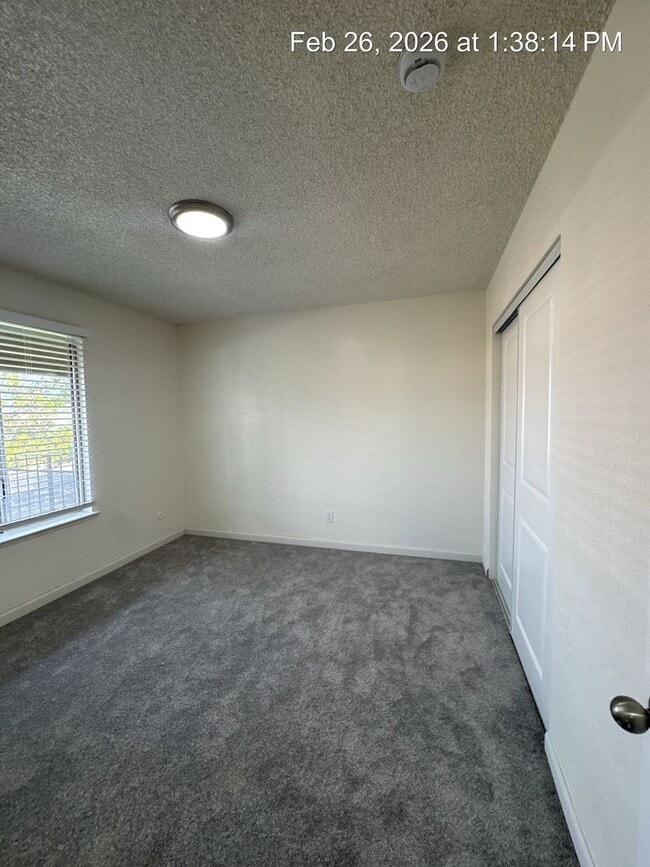 Building Photo - Upstairs unit available now!